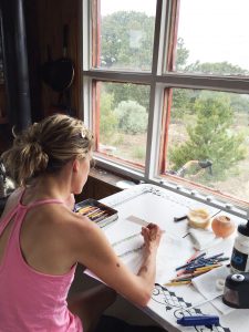 Kate Woodliff O'Donnell drawing at desk